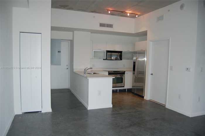 photo 1: 133 NE 2nd Ave Unit 907, Miami FL 33132