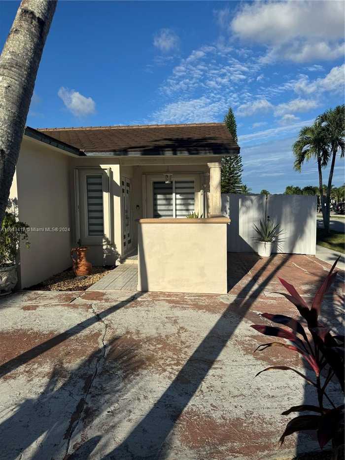 photo 1: 12872 NW 101st Pl, Hialeah Gardens FL 33018