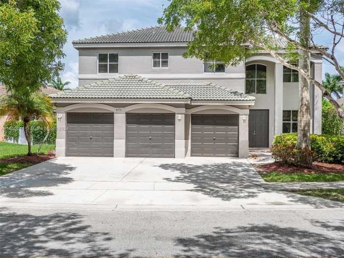 photo 1: 870 Nandina Dr, Weston FL 33327