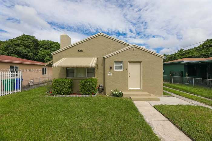 photo 1: 775 NW 41st St, Miami FL 33127