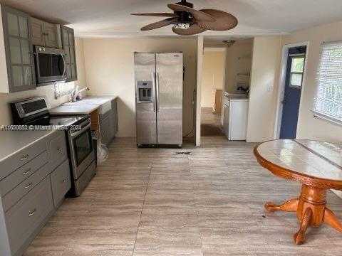 photo 1: 3141 SW 51th Ave, Davie FL 33314