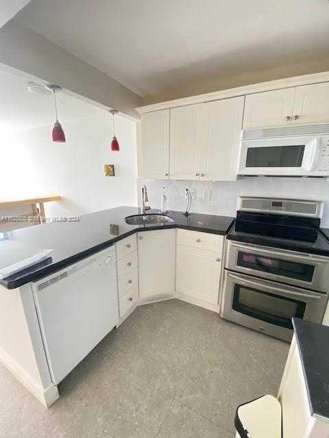 photo 2: 2899 Collins Ave Unit 548, Miami Beach FL 33140