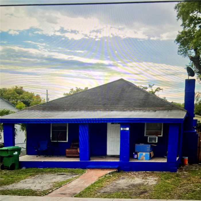 photo 1: 3144 NW 60th St, Miami FL 33142