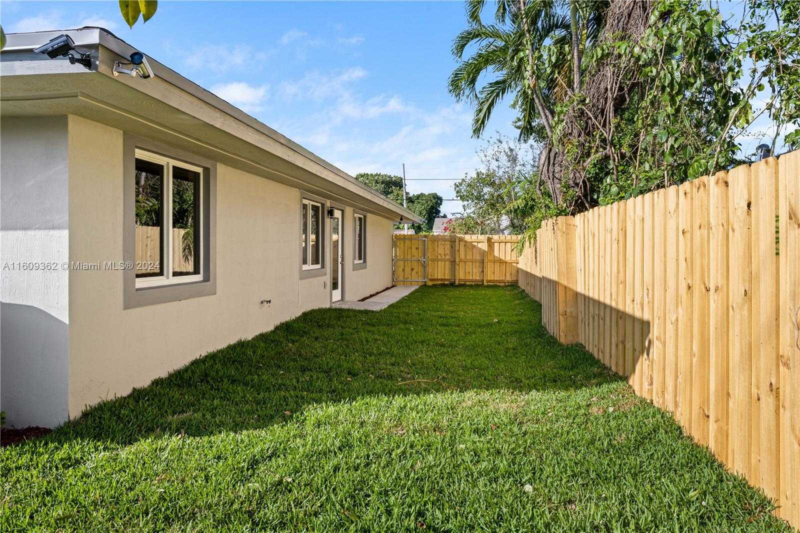 photo 2: 1760 NW 55th St, Miami FL 33142