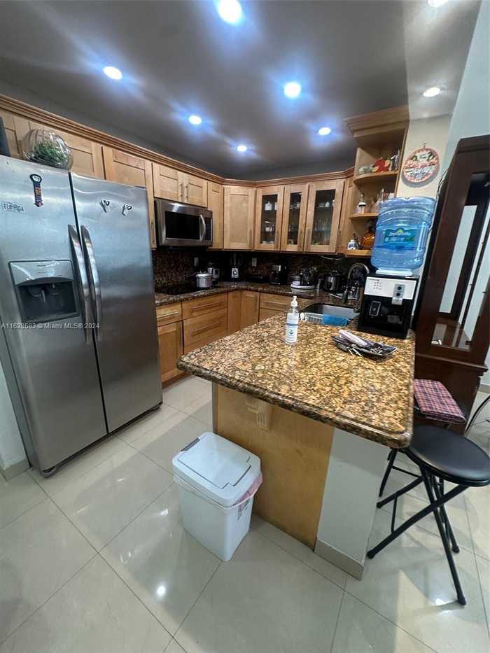 photo 1: 5665 W 20th Ave Unit 212, Hialeah FL 33012