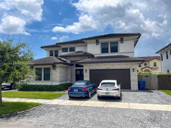 photo 1: 8904 SW 69th Ter, Miami FL 33173