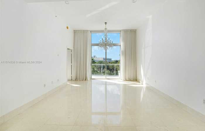 photo 1: 2001 Meridian Ave Unit 516, Miami Beach FL 33139