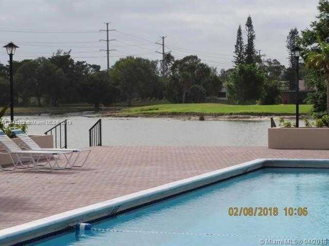 photo 3: 4170 Inverrary Dr Unit 111, Lauderhill FL 33319