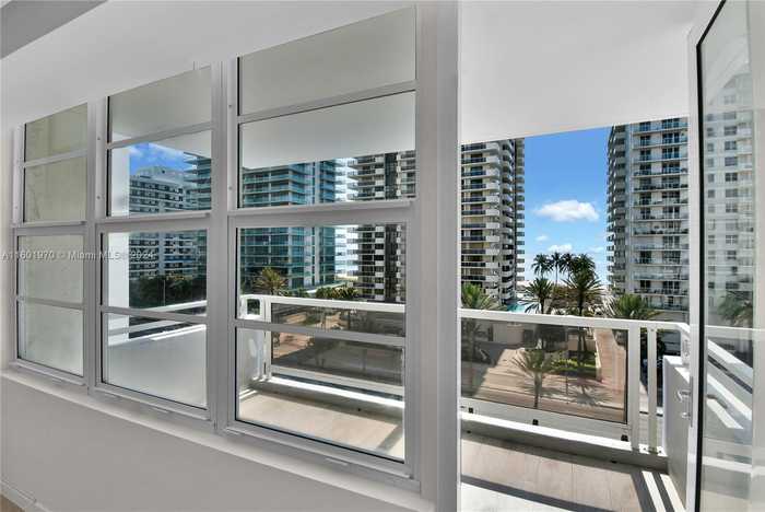 photo 1: 5700 Collins Ave Unit 7A, Miami Beach FL 33140