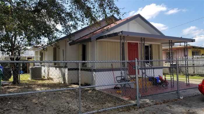 photo 1: 1932 NW 18th Ter, Miami FL 33125