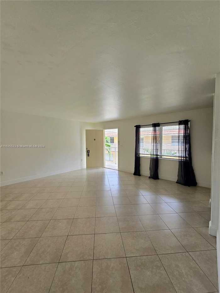 photo 1: 5325 SW 77th Ct Unit 210F, Miami FL 33155