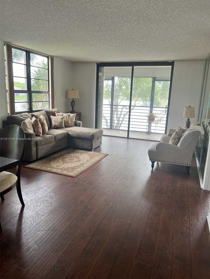 photo 1: 901 Colony Point Cir Unit 214, Pembroke Pines FL 33026