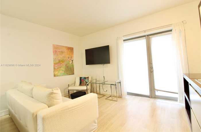 photo 1: 435 21st St Unit 102, Miami Beach FL 33139