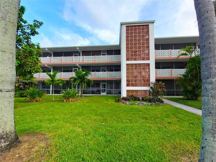 photo 1: 1430 NE 170th St Unit 318, North Miami Beach FL 33162