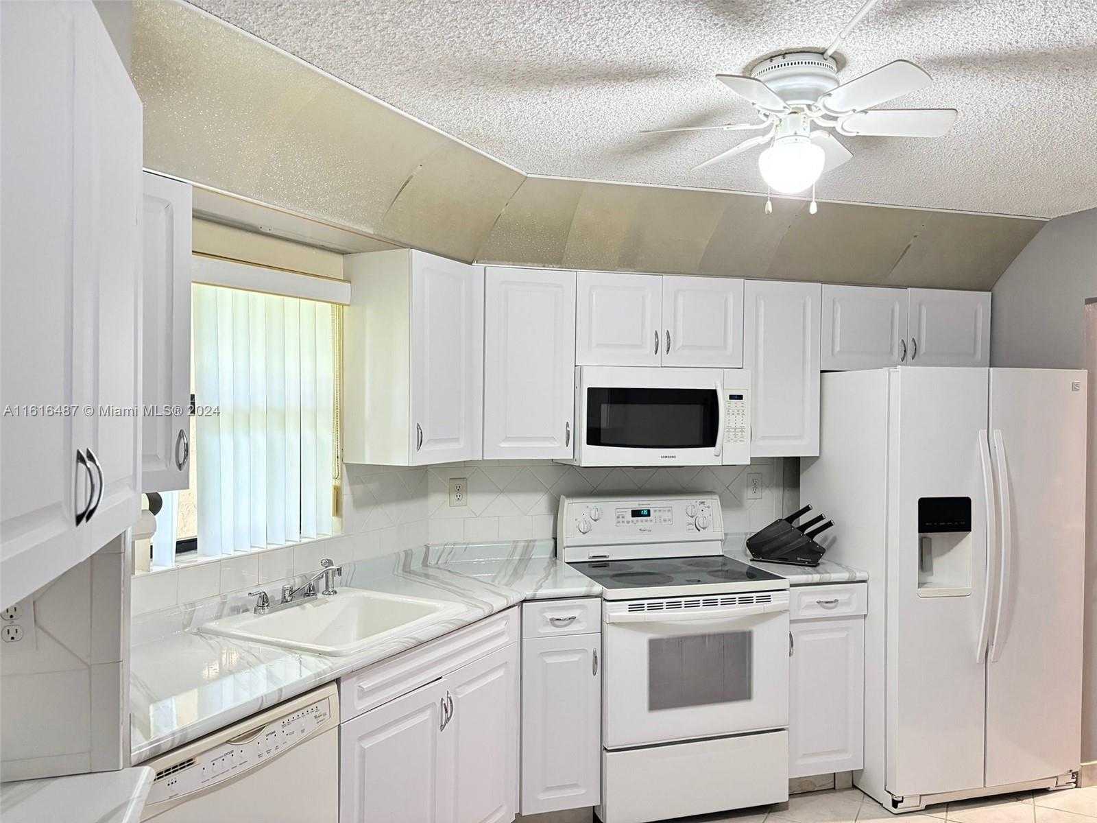 photo 2: 6555 W Broward Blvd Unit 103, Plantation FL 33317