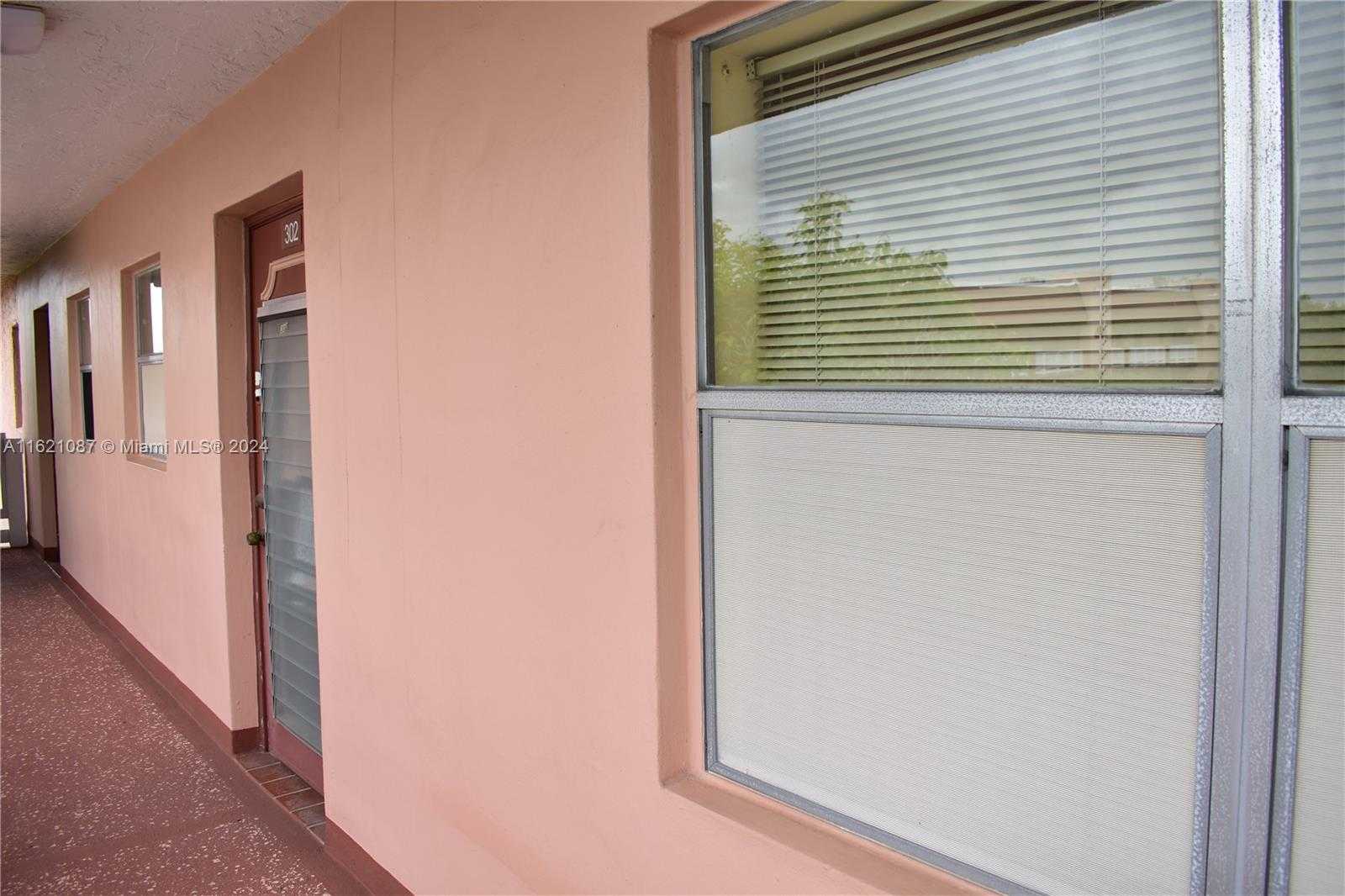 photo 1: 9621 Sunrise Lakes Blvd Unit 302, Sunrise FL 33322