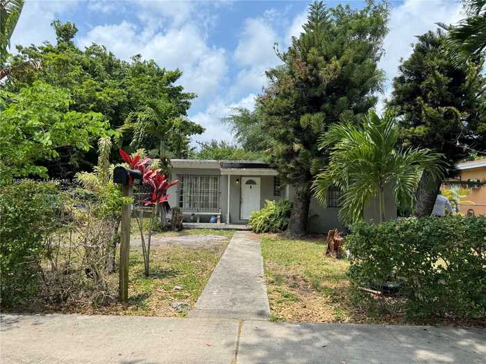 photo 1: 1255 NW 121st St, North Miami FL 33167