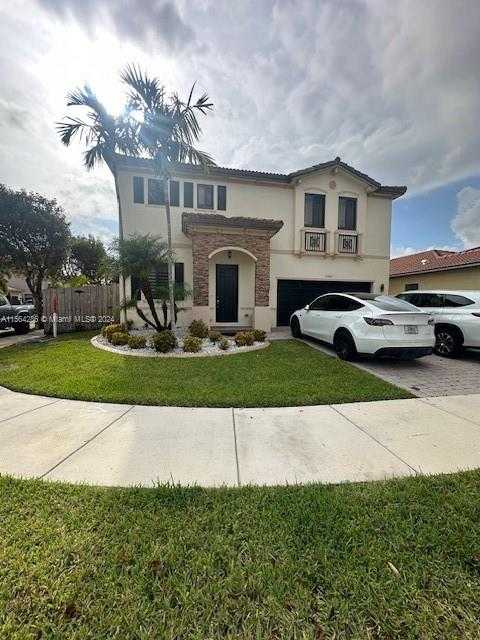 photo 1: 11766 SW 154th Ct, Miami FL 33196