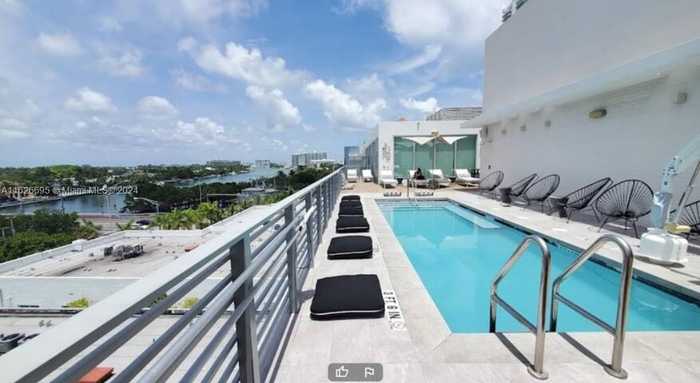 photo 1: 6080 Collins Avenue Unit PH09, Miami Beach FL 33140