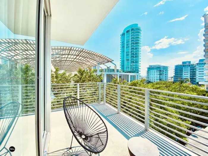 photo 2: 6080 Collins Avenue Unit PH09, Miami Beach FL 33140