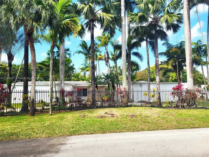 photo 1: 8290 Sunset Dr, Miami FL 33143