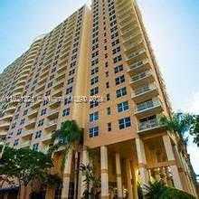 photo 1: 770 Claughton Island Dr Unit 406, Miami FL 33131