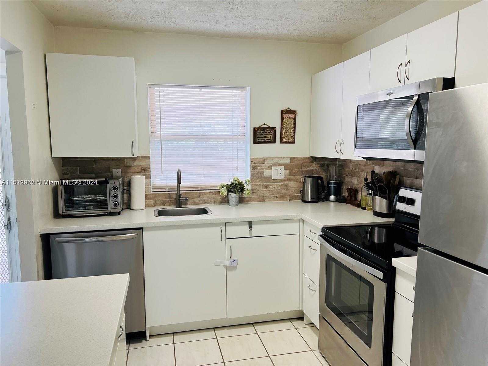 photo 1: 9581 Sunrise Lakes Blvd Unit 208, Sunrise FL 33322