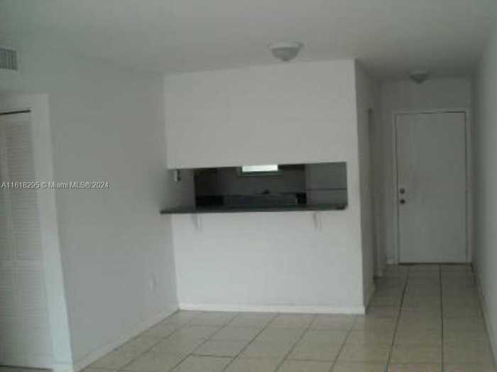 photo 2: 665 NE 83rd Ter Unit 202, Miami FL 33138