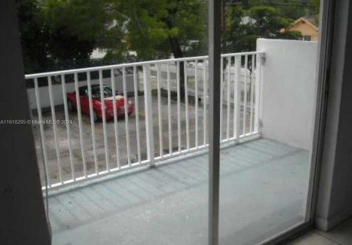 photo 4: 665 NE 83rd Ter Unit 202, Miami FL 33138