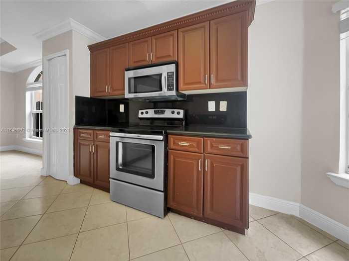 photo 1: 15371 SW 26th Ter, Miami FL 33185