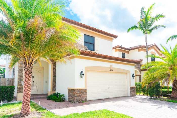 photo 1: 10016 NW 89th Ter, Doral FL 33178