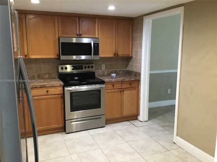 photo 2: 4136 Inverrary Dr Unit 15C, Lauderhill FL 33319