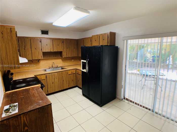 photo 2: 1560 SW 47th Ave, Fort Lauderdale FL 33317