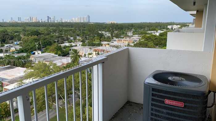 photo 1: 2000 NE 135th St Unit 910, North Miami FL 33181