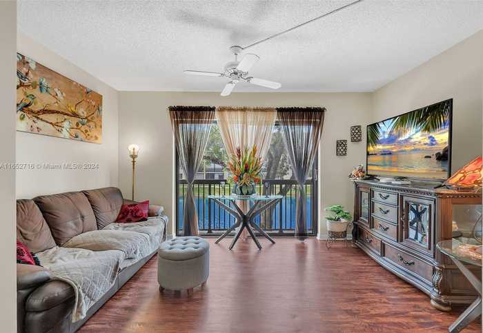 photo 2: 4975 E Sabal Palm Blvd Unit 211, Tamarac FL 33319