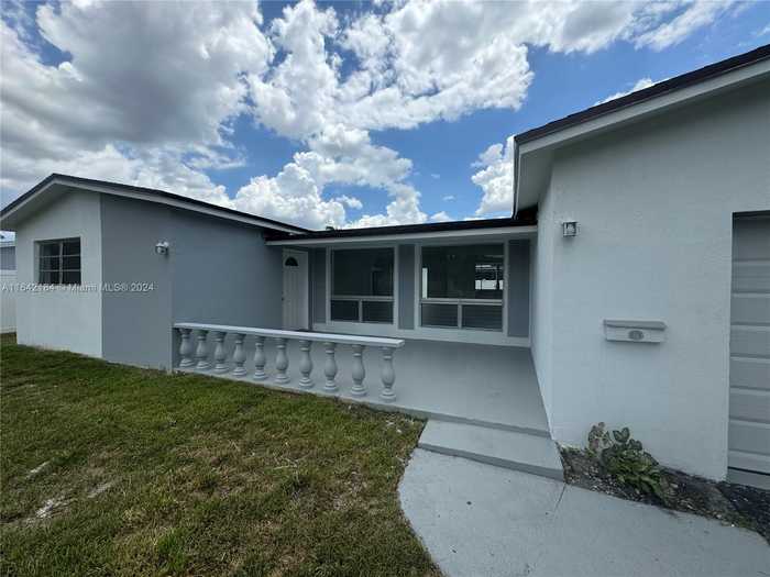 photo 1: 9160 SW 54th St, Cooper City FL 33328