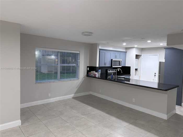 photo 2: 6200 S Falls Cir Dr Unit 101, Lauderhill FL 33319