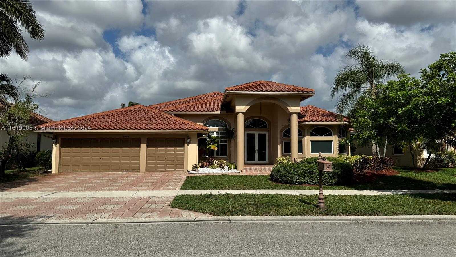 photo 1: 4023 NW 89th, Cooper City FL 33024