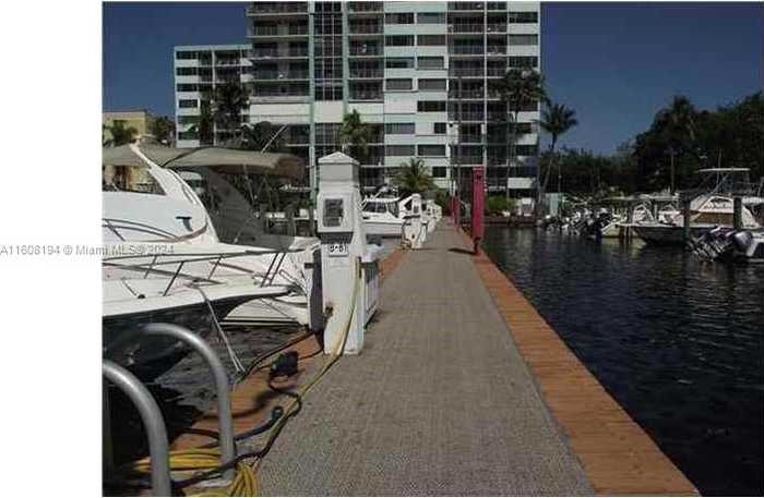 photo 1: 1700 NW North River Dr, Miami FL 33125