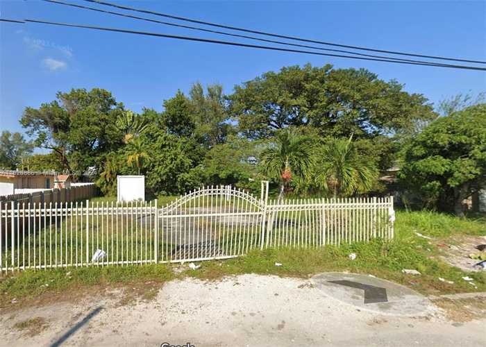 photo 1: 1445 NW 69th Ter, Miami FL 33147