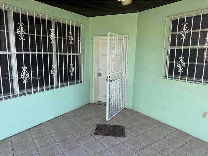 photo 2: 5147 NW 1st St, Miami FL 33126