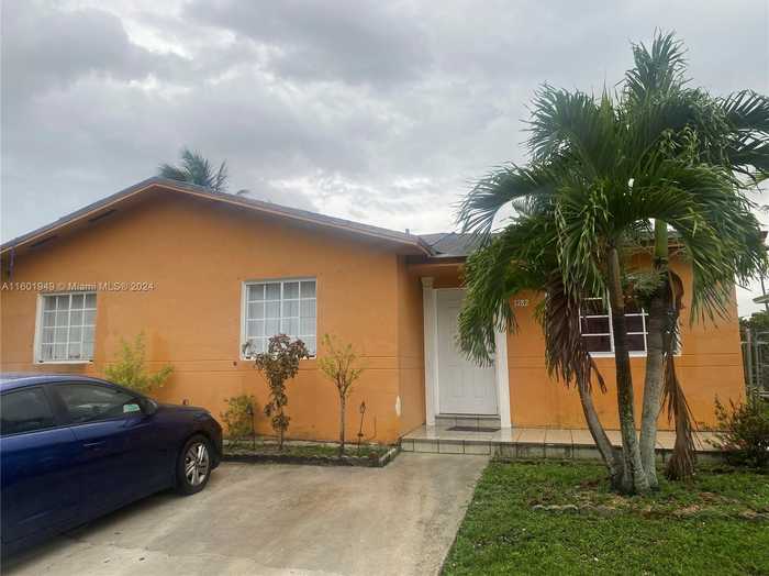 photo 1: 3782 NW 202nd St, Miami Gardens FL 33055