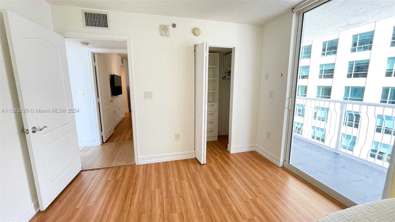 photo 3: 1200 Brickell Bay Dr Unit 1702, Miami FL 33131