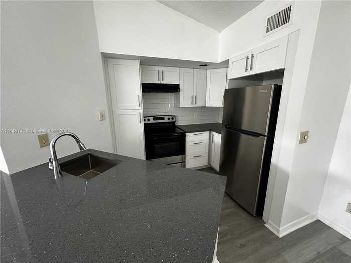 photo 2: 457 Vista Isles Dr Unit 2122, Sunrise FL 33325