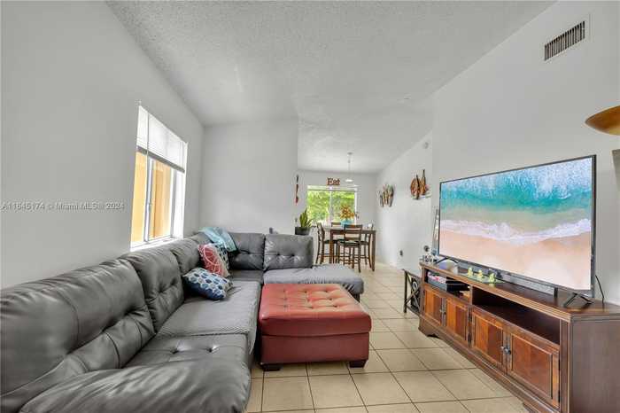 photo 1: 13342 SW 152nd St Unit 2702, Miami FL 33177