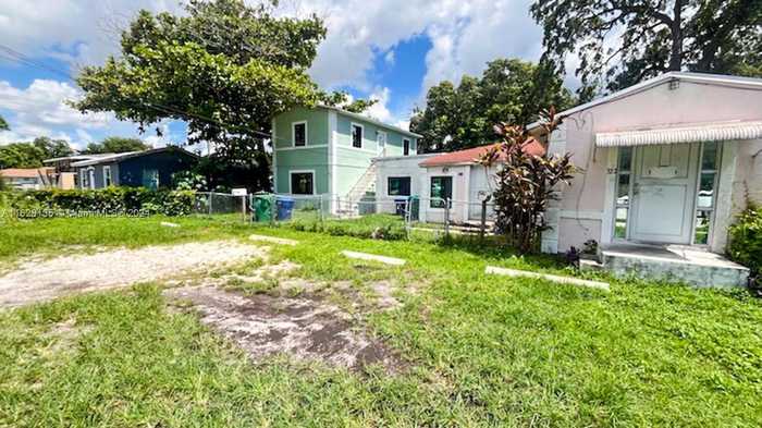 photo 1: 327 NW 95th St, Miami FL 33150