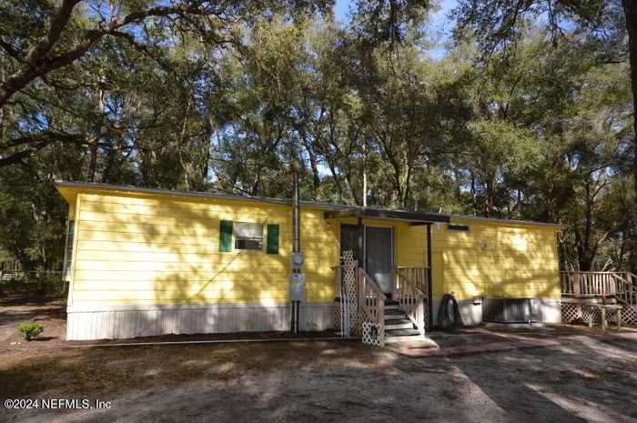 photo 1: 8217 SWAN LAKE Road, Melrose FL 32666