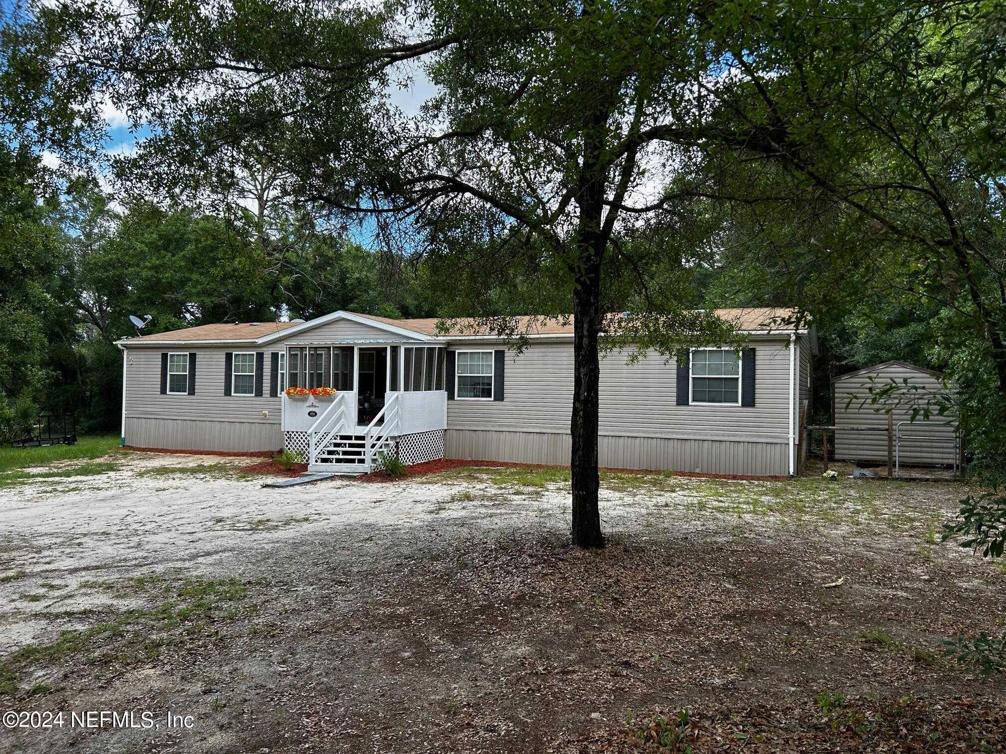 photo 1: 318 LAKE SERENA Drive, Melrose FL 32666