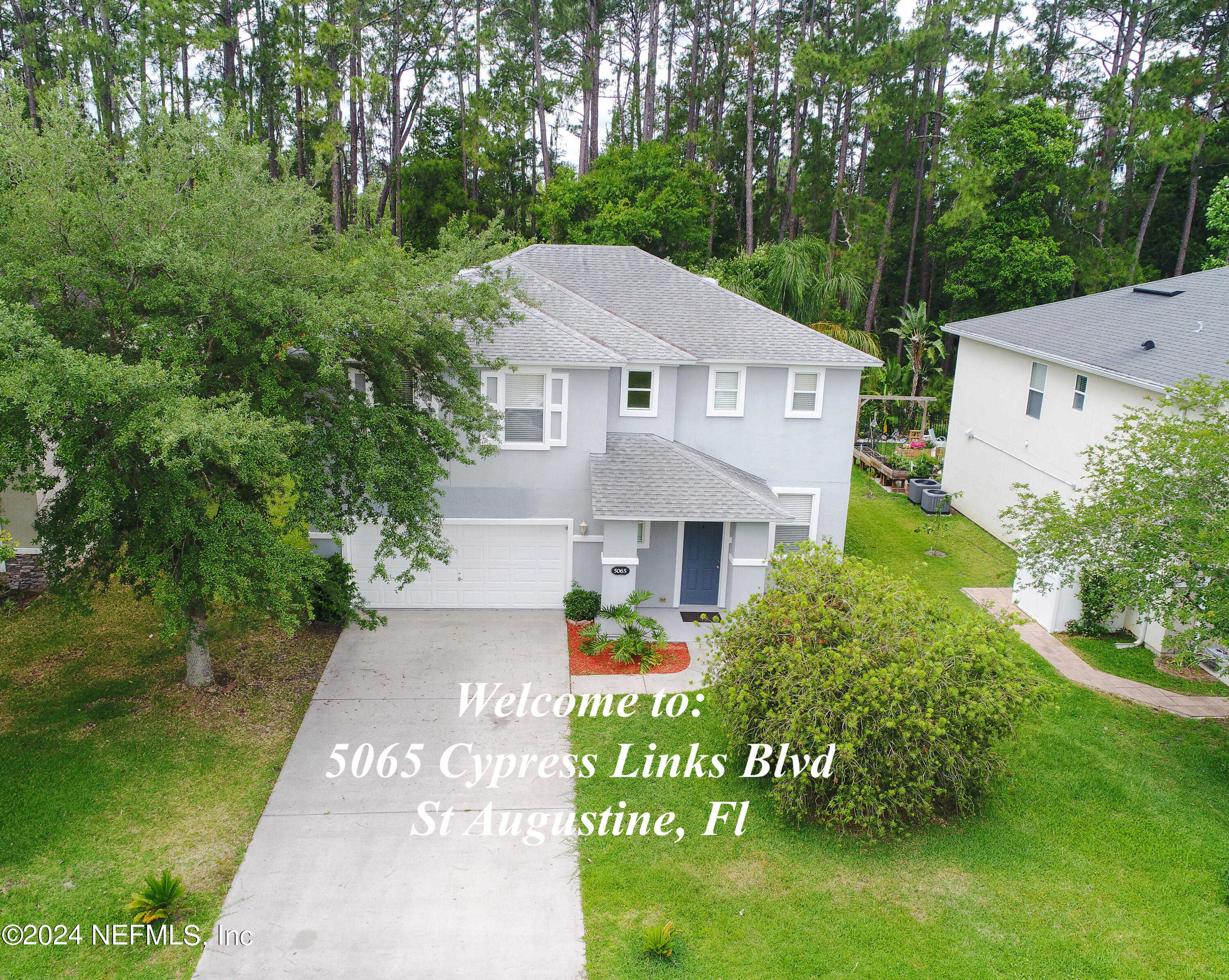 photo 1: 5065 CYPRESS LINKS Boulevard, Elkton FL 32033