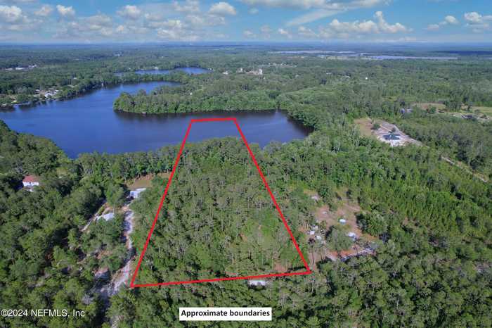 photo 2: 164 WHISPERING PINES Trail, Interlachen FL 32148